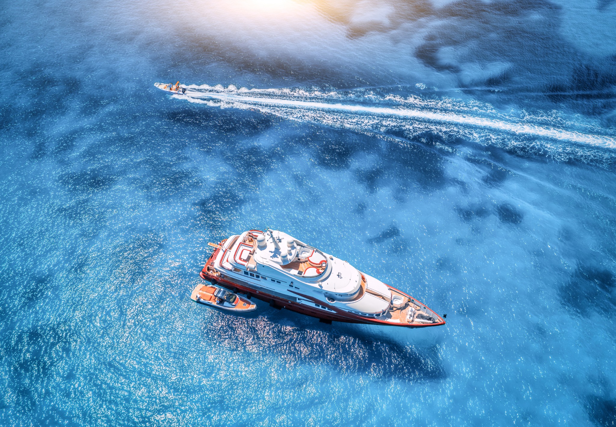Aerial photograph of luxury charter yacht on open sea